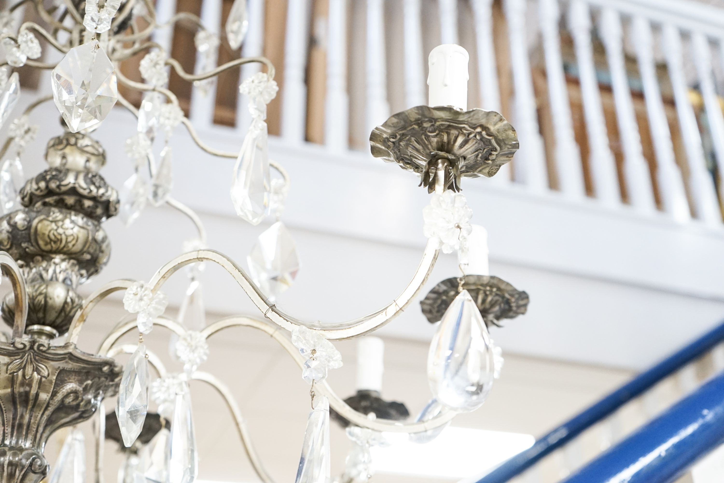 A silvered and crystal eight branch chandelier, approx. height 79cm